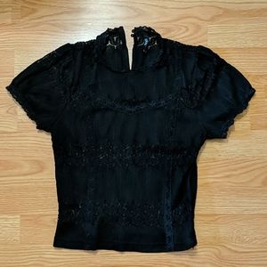 Black cropped top with see through lace detail